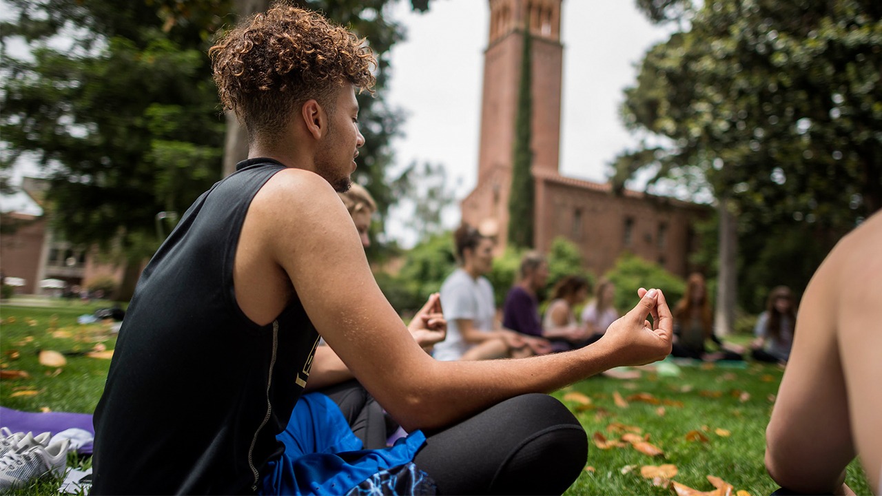 Chico State students doing yoga and meditation.
